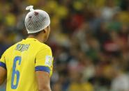 Ecuador's Cristian Noboa is seen with a bandage on his head, following a collision earlier, during their 2014 World Cup Group E soccer match against France at the Maracana stadium in Rio de Janeiro June 25, 2014. REUTERS/Sergio Moraes (BRAZIL - Tags: SOCCER SPORT WORLD CUP TPX IMAGES OF THE DAY)