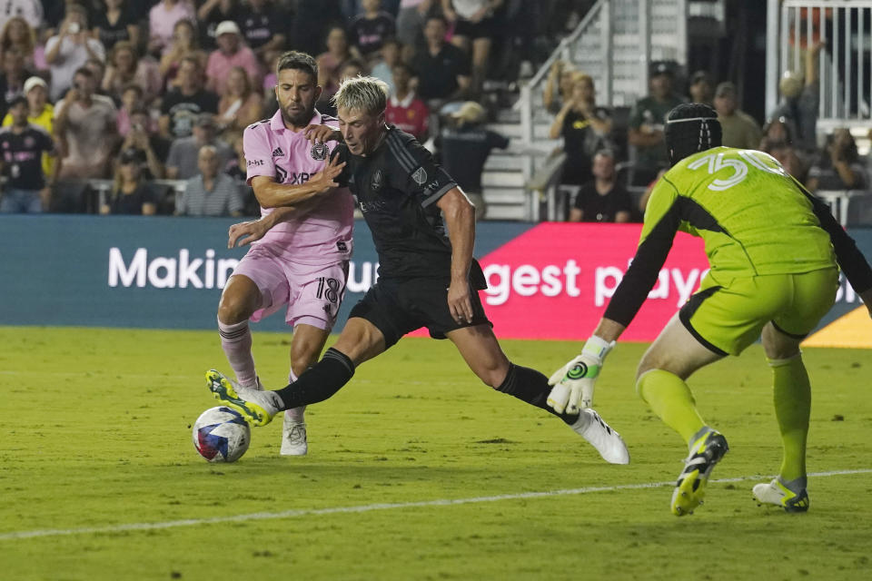 Nashville SC defender Lukas MacNaughton blocks a shot on goal by Inter Miami defender Jordi Alba (18) during the first half of an MLS soccer match, Wednesday, Aug. 30, 2023, in Fort Lauderdale, Fla. (AP Photo/Marta Lavandier)