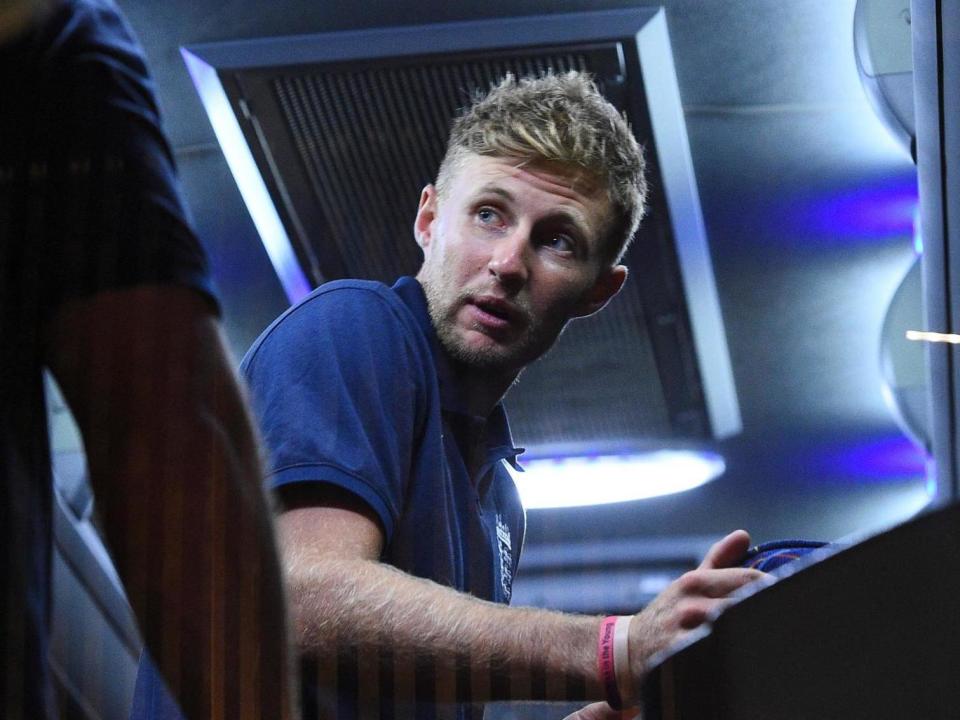 England captain Joe Root is seen inside a bus before leaving for the airport in Colombo: AFP