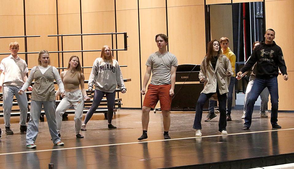 Members of Ashland High School's Sing & Swing rehearse for May Fiesta.