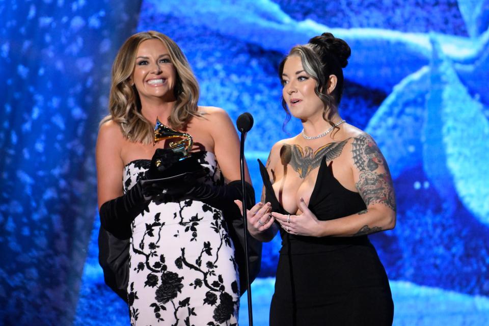 Feb 5, 2023; Los Angeles, CA, USA; Carly Pearce (left) and  Ashley McBryde accepts the award for best country duo/group performance during the Grammy Awards Premiere Ceremony at the Microsoft Theater in Los Angeles on Sunday, Feb. 5, 2023.. Mandatory Credit: Robert Hanashiro-USA TODAY