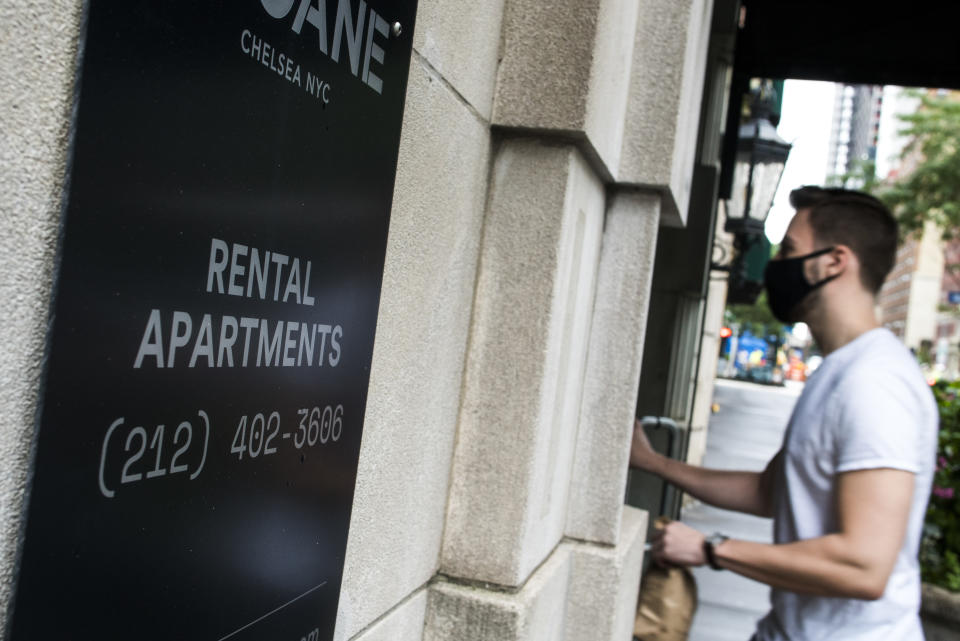 A man enters a building with rental apartments available in New York City. (Credit: Eduardo Muñoz Alvarez, VIEWpress via Getty Images)