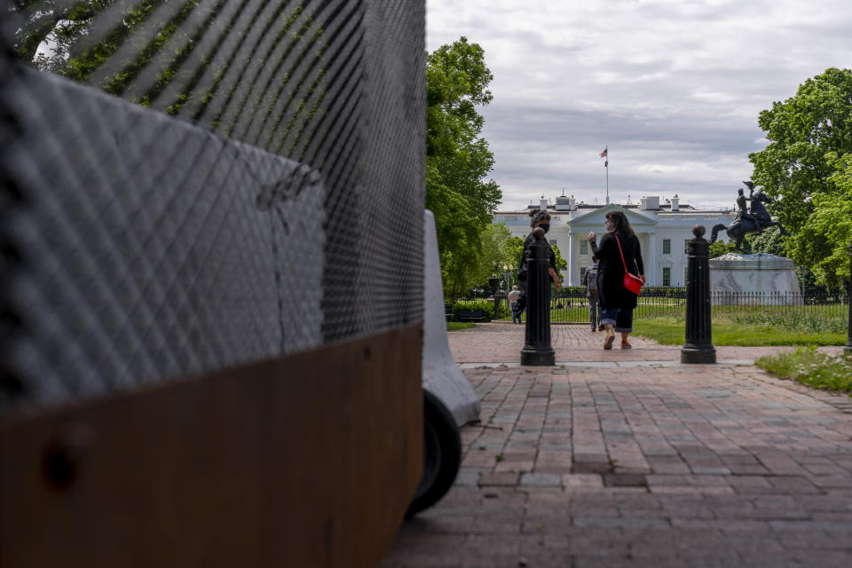 Lafayette Park, across the street from the White House, reopens in a limited capacity in Washington, Monday, May 10, 2021. Fencing remains in place around the park which will allow the Secret Service to temporarily close the park as they deem necessary. (AP Photo/Andrew Harnik)