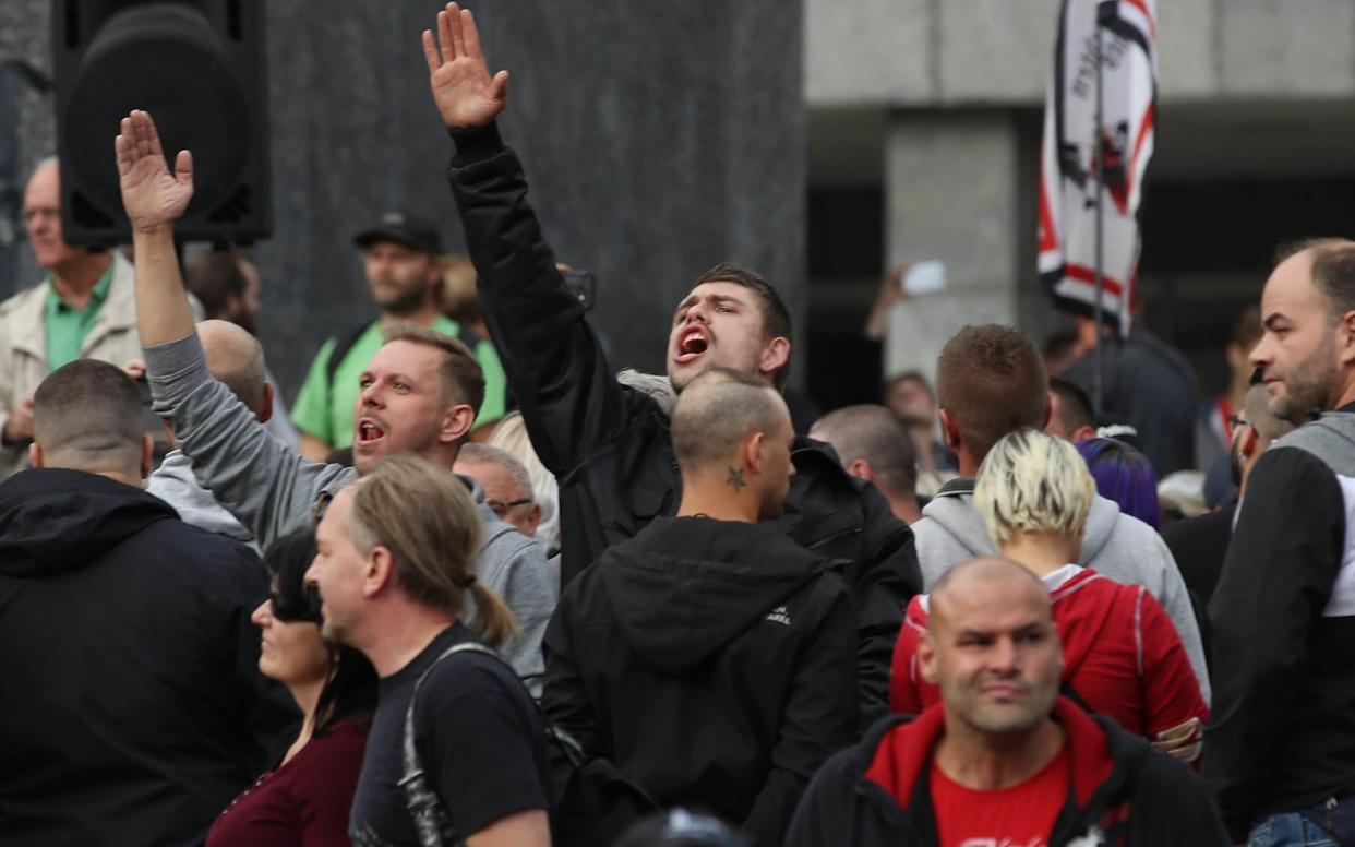 The men are accused of forming a far-Right terror group in Chemnitz following protests which saw neo-Nazis openly giving the Hitler salute in the city - Getty Images