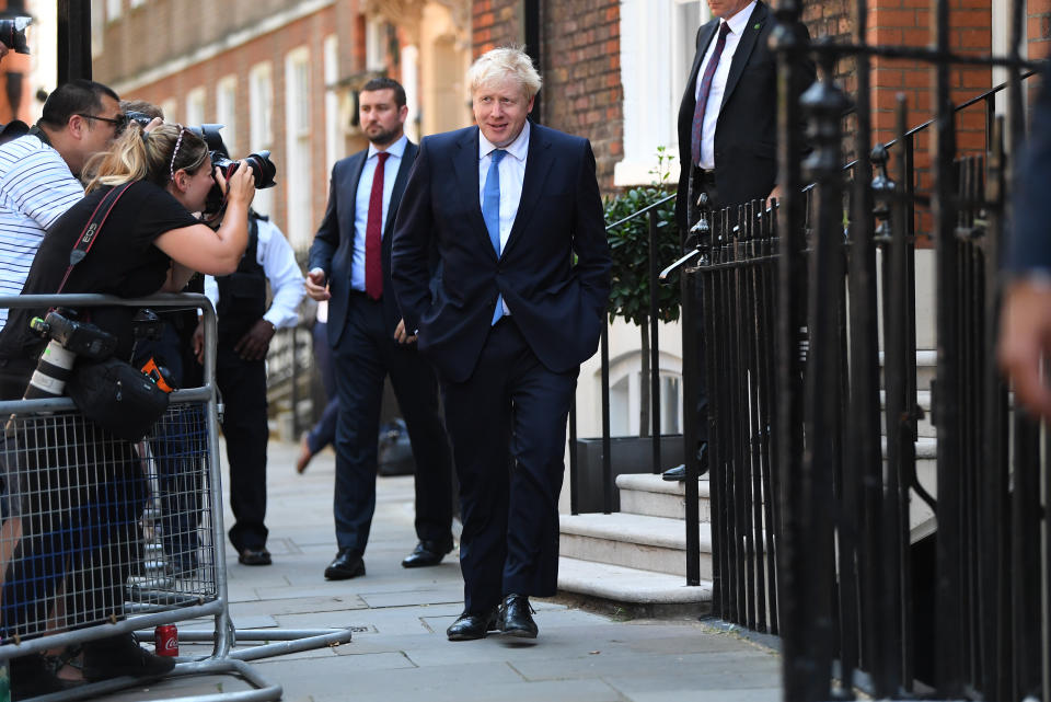 Newly elected leader of the Conservative party Boris Johnson leaves his office in Westminster, London, after it was announced he had won the leadership ballot and will become the next Prime Minister.