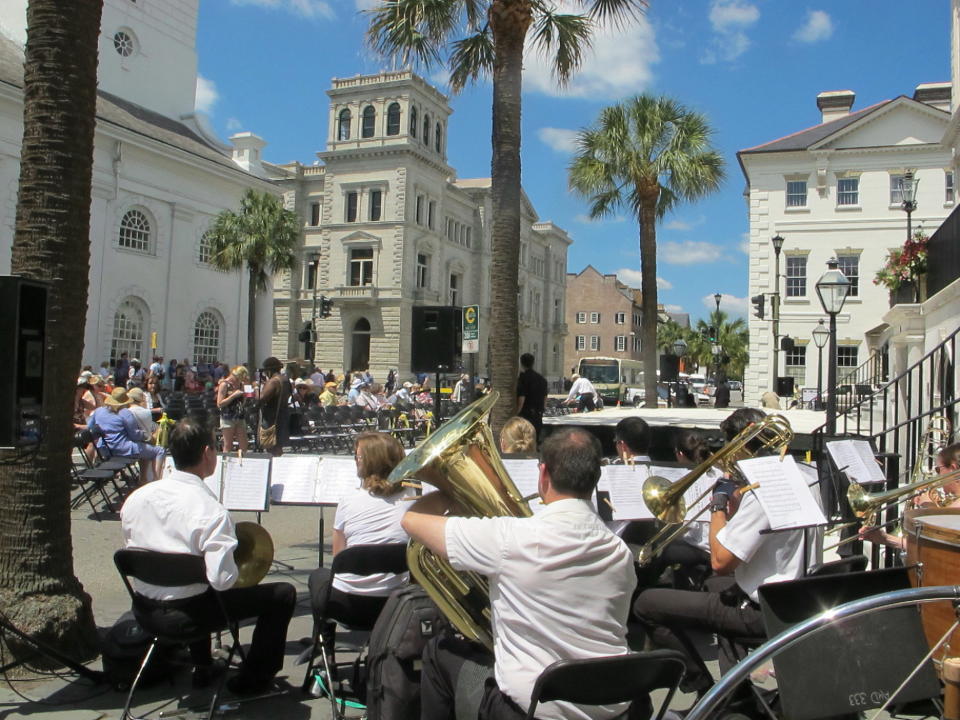 FILE - In this May 24, 2013 file photo, the Charleston Symphony Orchestra Brass Ensemble performs as the audience gathers for the opening ceremonies of the Spoleto Festival USA in Charleston, S.C. Tourism is an estimated $18 billion industry in South Carolina and a new season is gearing up the week of February 9, 2014, with the Governor's Conference on Tourism and Travel on Hilton Head Island, the Southeastern Wildlife Exposition in Charleston and other events. (AP Photo/Bruce Smith, File)