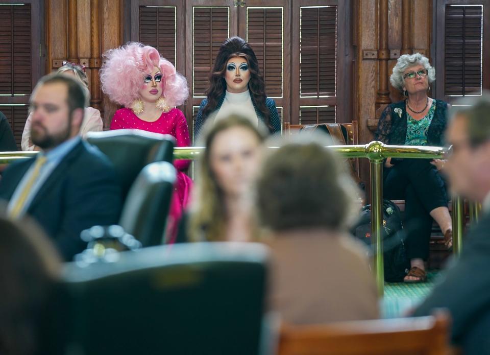 Drag performer Brigitte Bandit, left, and Lawrie Bird wait to testify at the Texas Senate in March against SB 12, a measure on drag shows and "sexually oriented performances."