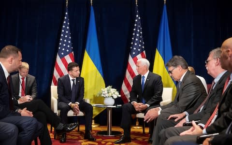 Mr Zelenskiy met with US vice president Mike Pence in Poland on Sunday - Credit: Ukrainian presidential press service via Reuters