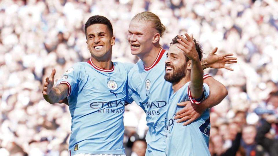 Erling Haaland, Joao Cancelo, Bernardo Silva Credit: Alamy