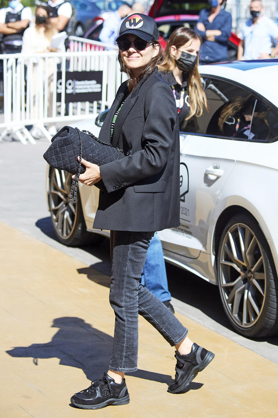 <p>Marion Cotillard flashes a smile on Sept. 17 as she arrives to her hotel during the 69th San Sebastian International Film Festival in Spain.</p>