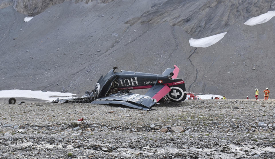 The photo provided by Police Graubuenden shows the wreckage of the old-time propeller plane Ju 52 after it went down went down Saturday Aug, 4 2018 on the Piz Segnas mountain above the Swiss Alpine resort of Flims, striking the mountain's western flank about 2,540 meters (8,330 feet) above sea level. All 20 people on board were killed, police said Sunday, Aug. 5, 2018. (Polizei Graubuenden via AP)