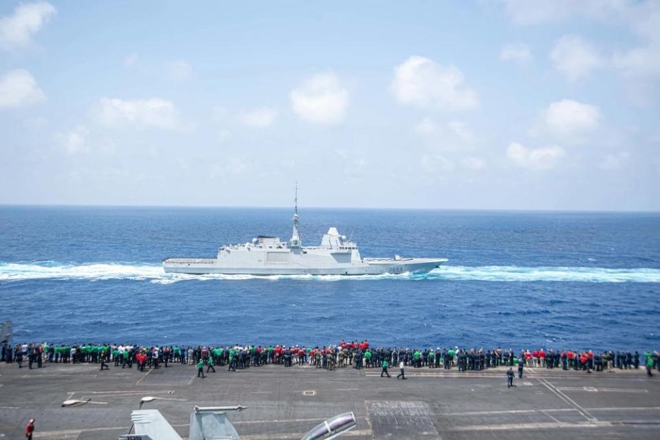 French Navy Frigate FS Languedoc transits alongside USS Harry S. Truman