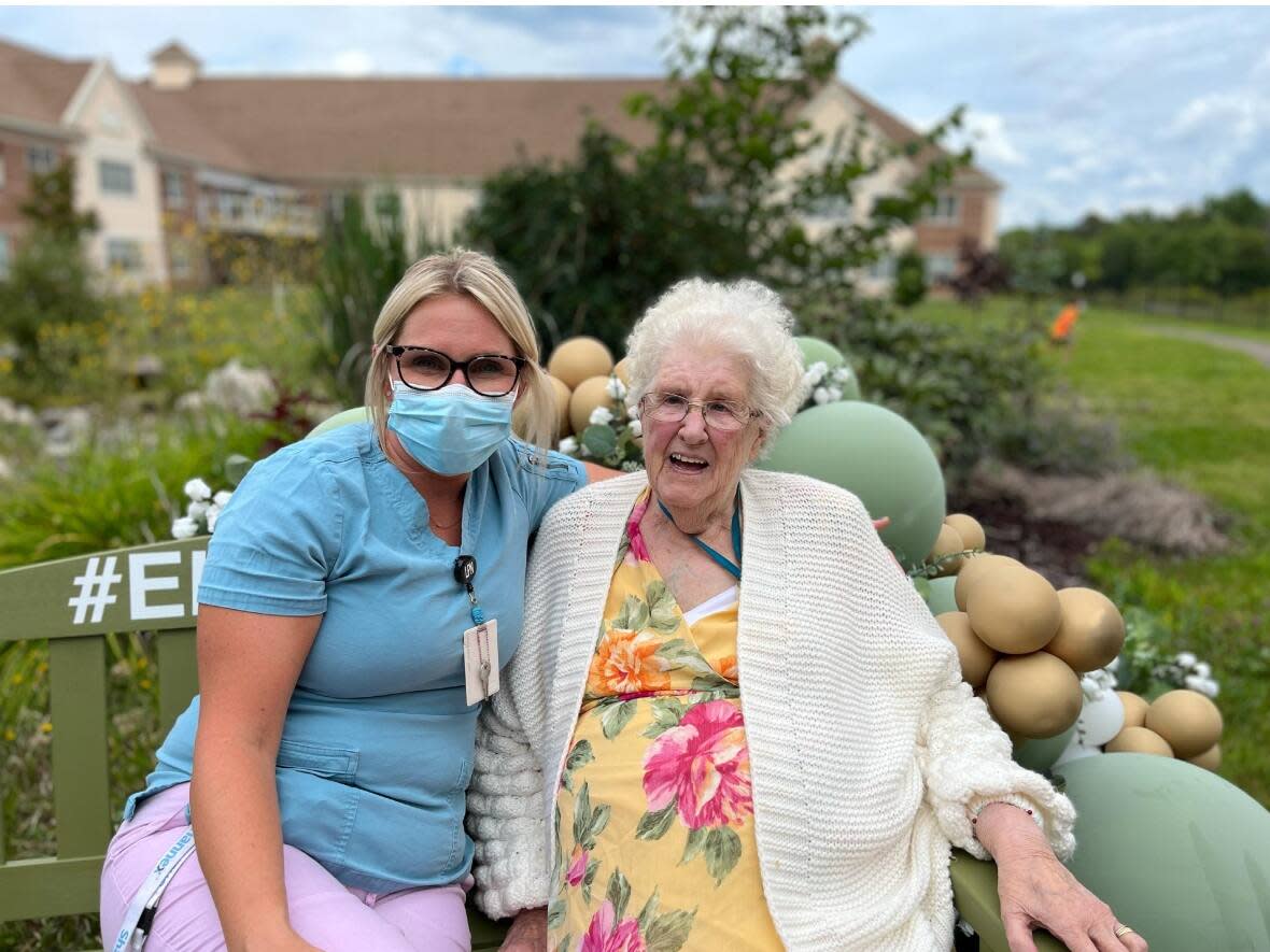 The oldest at the unveiling of the green bench at the Shannex home in Fredericton was 100 years old, and the youngest was three.  (Submitted by Laura Baxter - image credit)