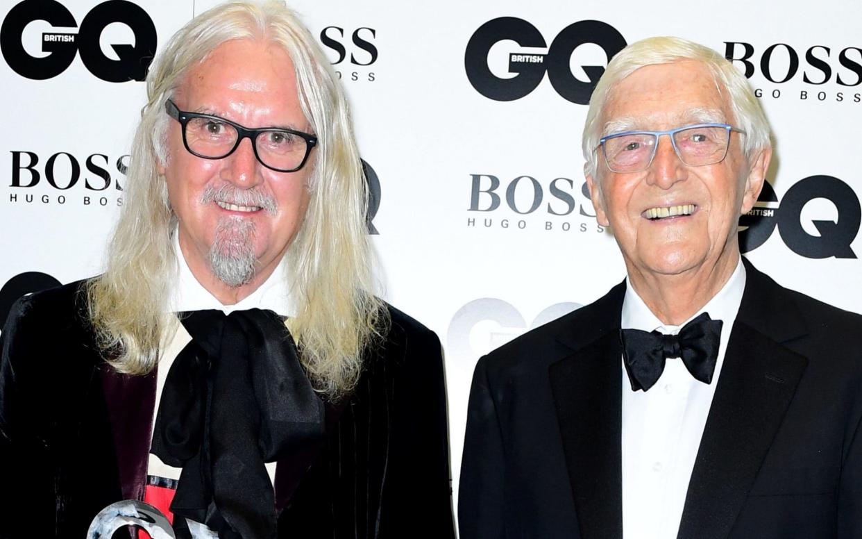 Billy Connolly and Michael Parkinson at the 2016 GQ Awards - PA