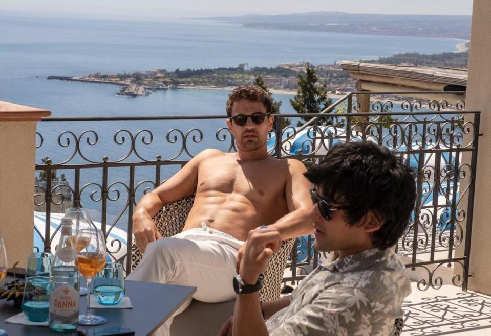 Theo James sat on the terrace of the San Domenico palace, aka The White Lotus (HBO/The White Lotus)