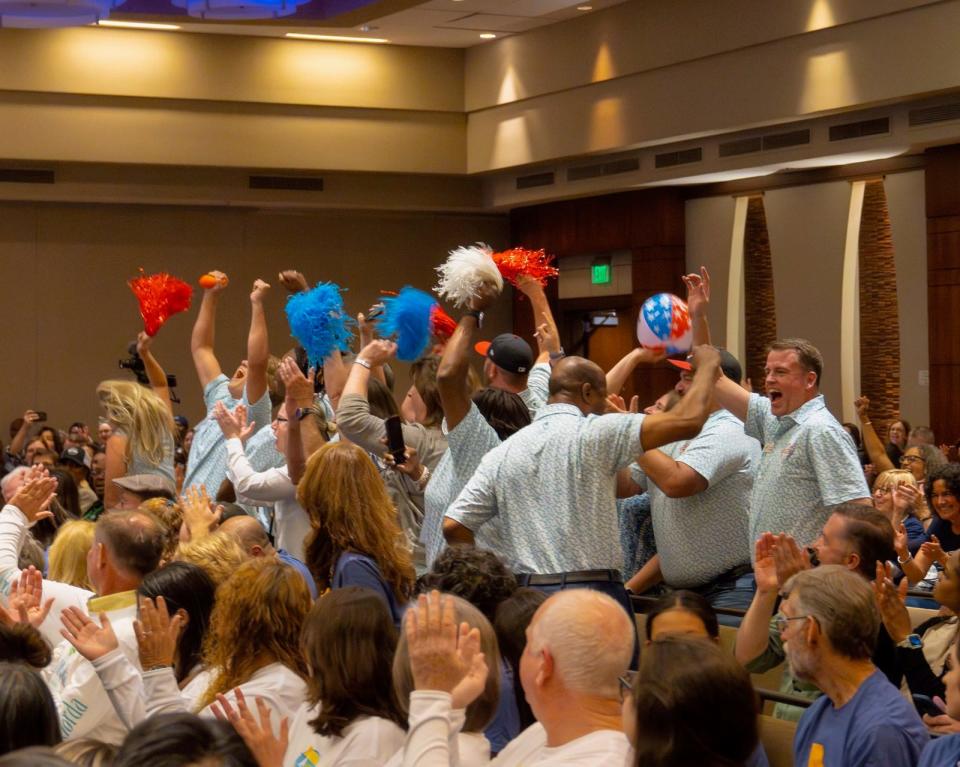 The delegation from Watkinsville reacts with joy after it was announced they won the All-American City Award in Denver, Colorado.