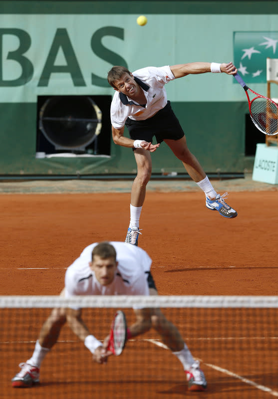 Belarus Max Mirnyi (L) and Canada's Daniel Nestor (R) hit a return to US Bob Bryan and US Mike Bryan during Men's Doubles final tennis match of the French Open tennis tournament at the Roland Garros stadium, on June 9, 2012 in Paris. AFP PHOTO / THOMAS COEXTHOMAS COEX/AFP/GettyImages