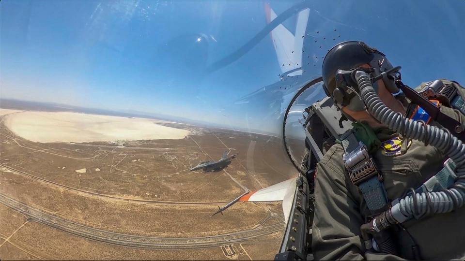This image from remote video released by the U.S. Air Force shows Air Force Secretary Frank Kendall flying inside the cockpit of an autonomous X-62A VISTA jet above Edwards Air Base, Calif., May 2, 2024. (U.S. Air Force via AP)