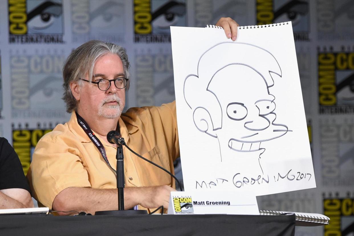 Matt Groening holds up a drawing of Apu at the San Diego Comic-Con last year: Getty Images