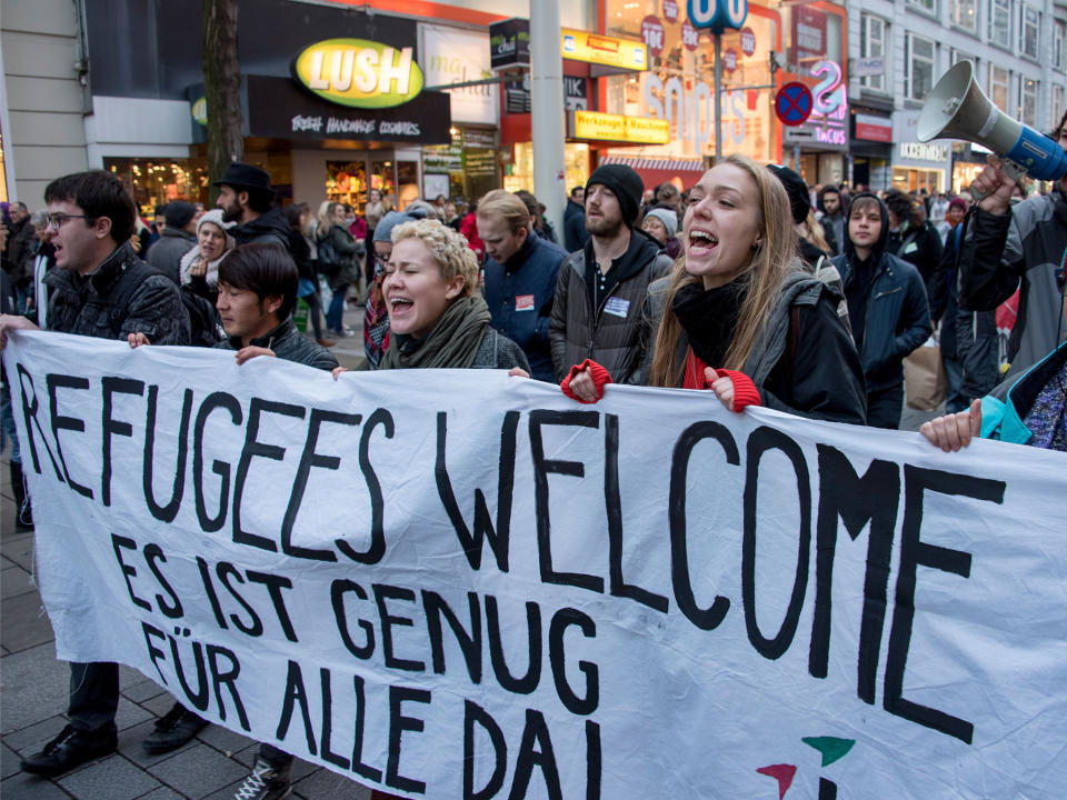 Austrian citizens and asylum seekers march during a pro-refugee protest called 'Let them stay' in Vienna, Austria, in November 2016: JOE KLAMAR/AFP/Getty Images