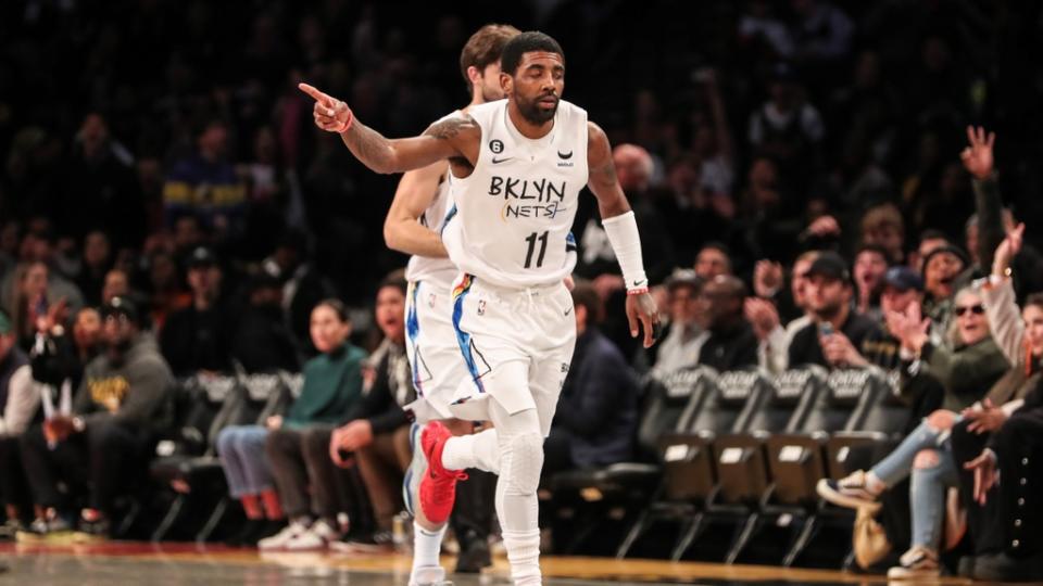 Nov 20, 2022; Brooklyn, New York, USA; Brooklyn Nets guard Kyrie Irving (11) heads back down court after scoring in the first quarter against the Memphis Grizzlies at Barclays Center. Mandatory Credit: Wendell Cruz-USA TODAY Sports