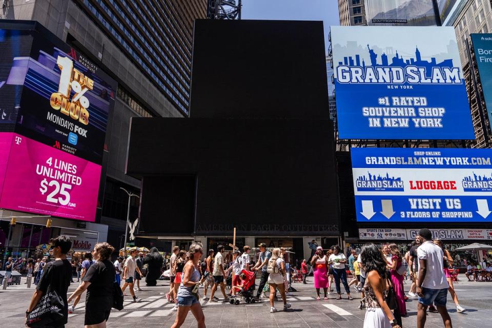 In New York, several of Times Square’s famous billboards were down (Getty)