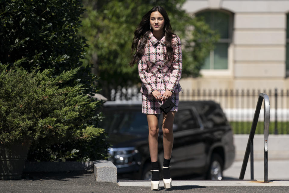 Singer Olivia Rodrigo arrives at the White House to promote the COVID-19 vaccine, Wednesday, July 14, 2021, in Washington. (AP Photo/Evan Vucci)