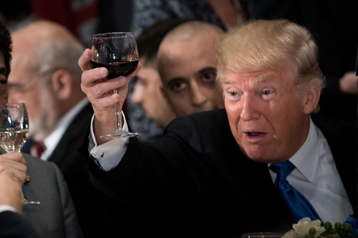 Donald Trump appeared to raise a wine glass twice at the UN luncheon: AFP/Getty Images