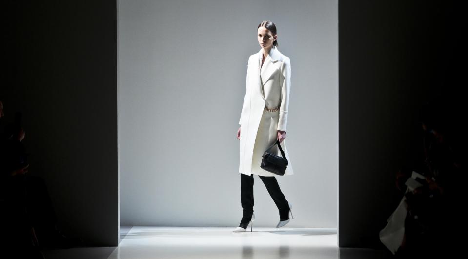 Fashion from the Victoria Beckham Fall 2014 collection is modeled, during New York Fashion Week on Sunday Feb. 9, 2014. (AP Photo/Bebeto Matthews)