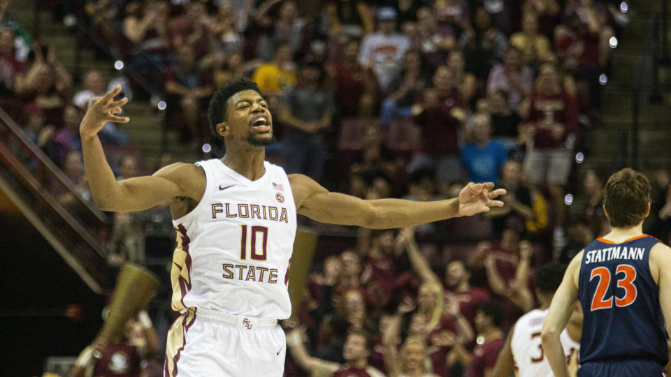 Florida State forward Malik Osborne (10) reacts to hitting a 3-point shot in the first half of the team's NCAA college basketball game against Virginia in Tallahassee, Fla., Wednesday, Jan. 15, 2020. (AP Photo/Mark Wallheiser)