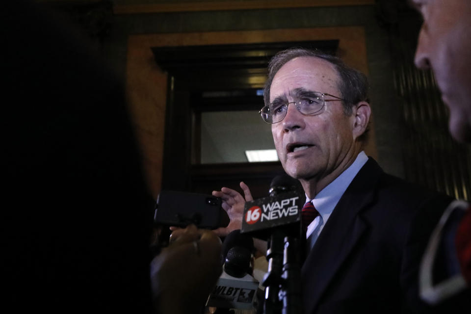 Lt. Gov. Delbert Hosemann addresses reporters after the Senate passed legislation to change the Mississippi state flag Sunday, June 28, 2020, at the Capitol in Jackson, Miss. Both chambers of the Mississippi Legislature passed the bill to take down the state flag, which contains the Confederate battle emblem. Gov. Tate Reeves has already said he would sign whatever flag bill the Legislature decides on. (AP Photo/Rogelio V. Solis)