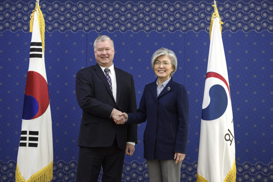 U.S. Special Representative for North Korea Stephen Beigun, left, and South Korean Foreign Minister Kang Kyung-wha pose for a photo during their meeting at Foreign Ministry in Seoul Saturday, Feb. 9, 2019. Beigun returned from three days of talks in Pyongyang, North Korea, before the second summit between U.S. President Donald Trump and North Korean leader Kim Jong Un in Vietnam later this month. (Ed Jones/Pool Photo via AP)