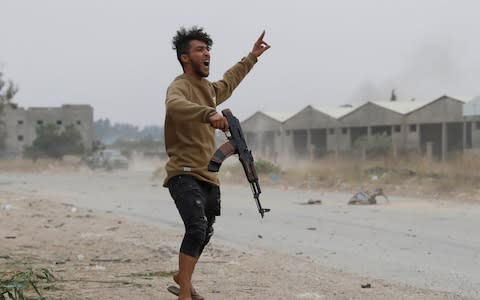 A fighter loyal to Libya's UN-backed government on the outskirts of Tripoli - Credit: REUTERS/Goran Tomasevic