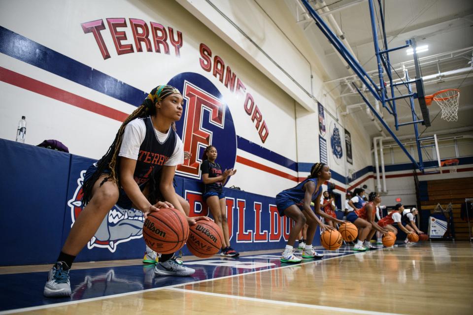 The Terry Sanford girls’ basketball team practices on Tuesday, Nov. 16, 2021.