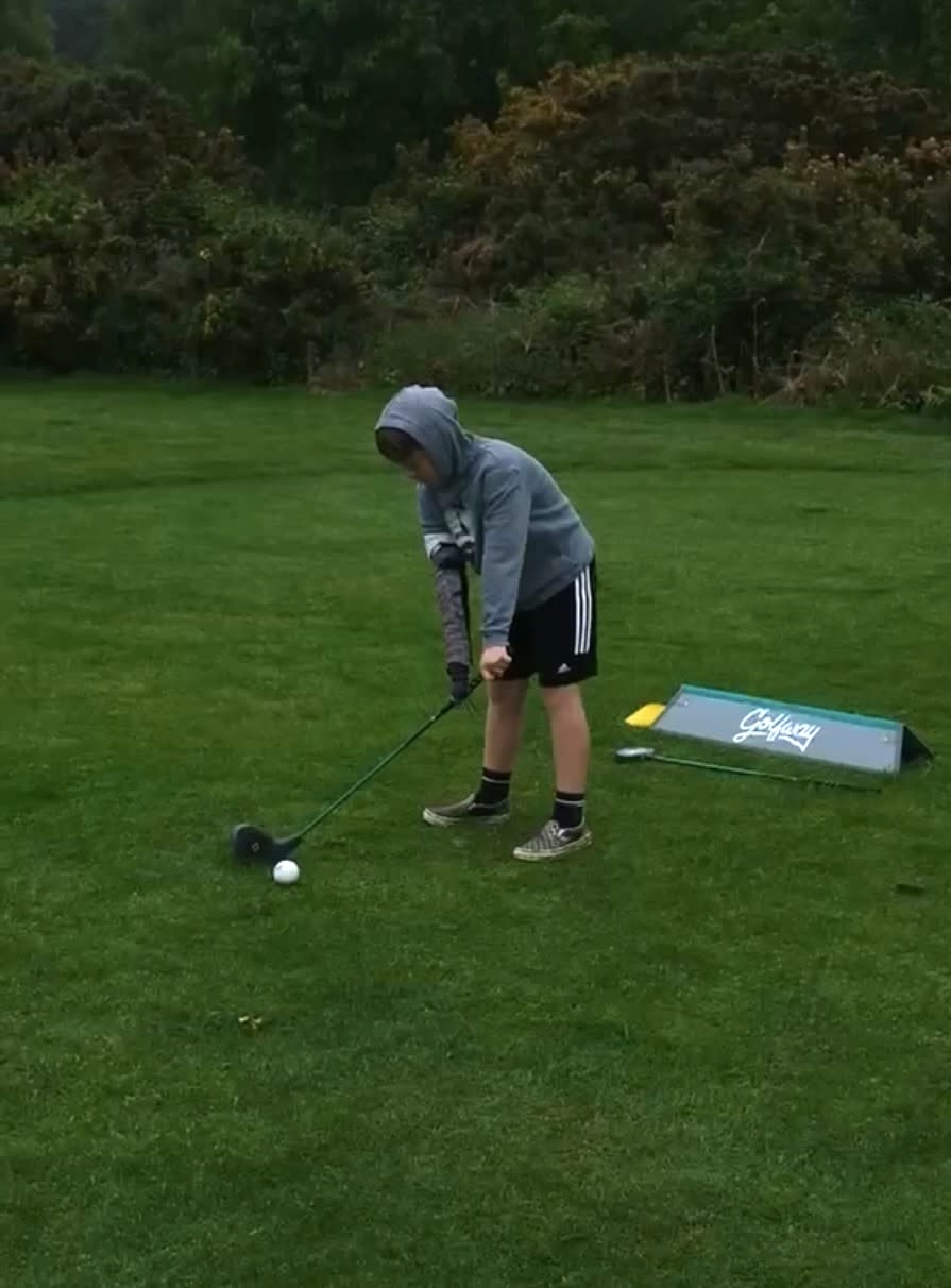 Freddie Tarr holding a golf club 