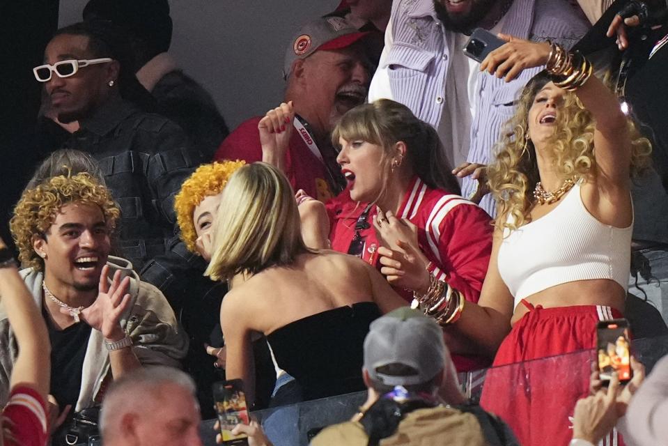 Taylor Swift, center celebrates with friends after the NFL Super Bowl 58 football game between the San Francisco 49ers and the Kansas City Chiefs on Sunday, Feb. 11, 2024, in Las Vegas. The Chiefs won 25-22. (AP Photo/Frank Franklin II)