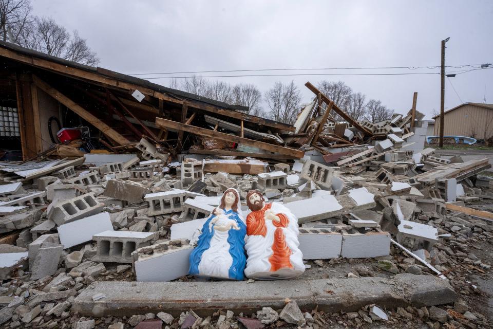 A nativity scene rests in front of a home leveled in the Geiger Mobile Home Park. Two residents of the Park died when homes were destroyed during a tornado that swept through the area.