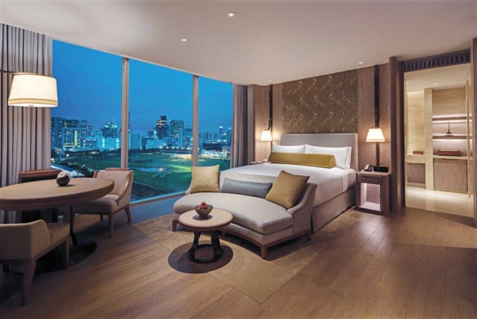 guest bedroom Waldorf Astoria Bangkok Deluxe Bedroom source hilton