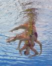 <p>Claudia Holzner and Jacqueline Simoneau of Canada compete in the synchronized Women’s Duet Technical Preliminary at the 17th FINA World Aquatics Championships in, Budapest, Hungary, July 14, 2017. (Photo: Michael Dalder/Reuters) </p>