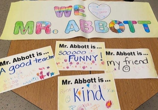 Students helped color in these signs for Ken Abbott's "Good Morning America" celebration.