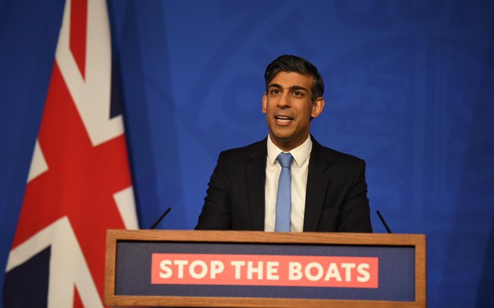 Rishi Sunak, the Prime Minister, is pictured this morning in No 9 Downing Street