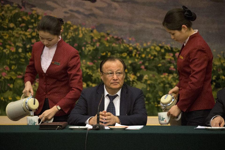 Shohrat Zakir, chairman of the Xinjiang Uyghur Autonomous Region, attends a meeting on the sideline of the National People's Congress in Beijing, China, Sunday, March 12, 2017. China's ruling Communist Party is hardening its rhetoric about Islam, with top officials making repeated warnings this past week about the specter of global religious extremism seeping into the country. (AP Photo/Ng Han Guan)