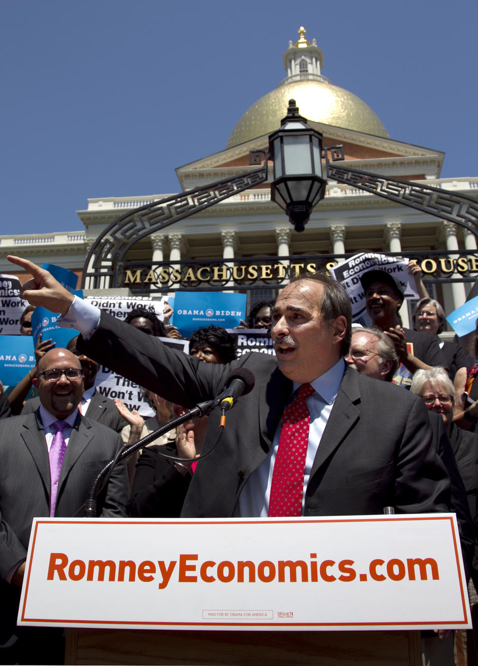 David Axelrod, a strategist for President Obama, addresses a crowd in front of the Statehouse, in Boston Thursday, May 31, 2012. Axelrod criticized former Mass. Gov. and Republican Presidential candidate Mitt Romney's record as governor of the state during his remarks. (AP Photo/Steven Senne)