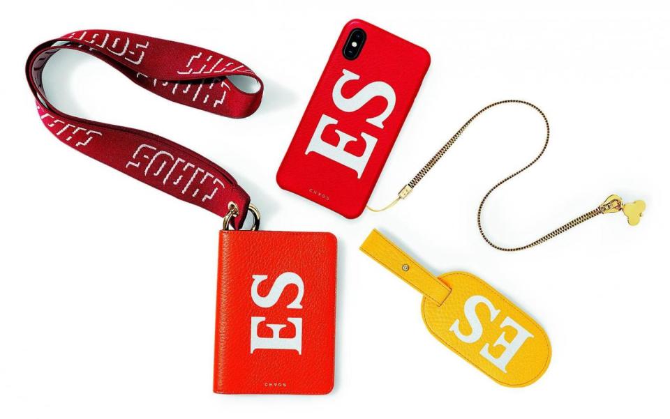 Above, Chaos at Selfridges. CHAOS iPhone case, £165;gold plated zip lanyard, £90;luggage tag, £150;passport cover, £170;elastic lanyard, £75 (chaos.club)