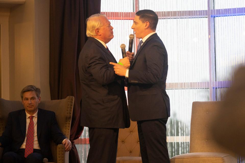 Mike Gibbons, left, and Josh Mandel exchange heated arguments at the FreedomWorks Forum for Ohio's Republican Senate Candidates on March 18, 2022, in Columbus, Ohio. The forum was attended by candidates Matt Dolan, Mike Gibbons, Josh Mandel, Jane Timken and JD Vance.