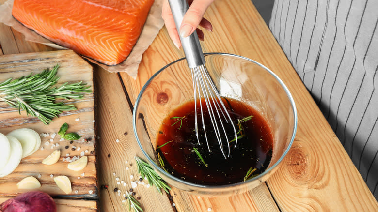 whisking teriyaki marinade in bowl