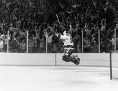 FILE - In this Feb. 22, 1980, file photo, U.S. goalie James Craig leaps high in the air in the final second of a 4-3 win over the Soviet Union in a medal match at the 1980 Winter Olympics in Lake Placid, N.Y. (AP Photo/File)