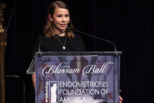 <p>Jamie McCarthy/Getty</p> Blossom Award Honoree Bindi Irwin speaks onstage during the Endometriosis Foundation Of America's (EndoFound) 12th Annual Blossom Ball