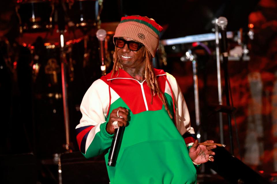 US rapper Lil Wayne performs on stage during the Recording Academy and Clive Davis pre-Grammy gala at the Beverly Hilton hotel in Beverly Hills, California on February 4, 2023. (Photo by Michael TRAN / AFP) (Photo by MICHAEL TRAN/AFP via Getty Images)