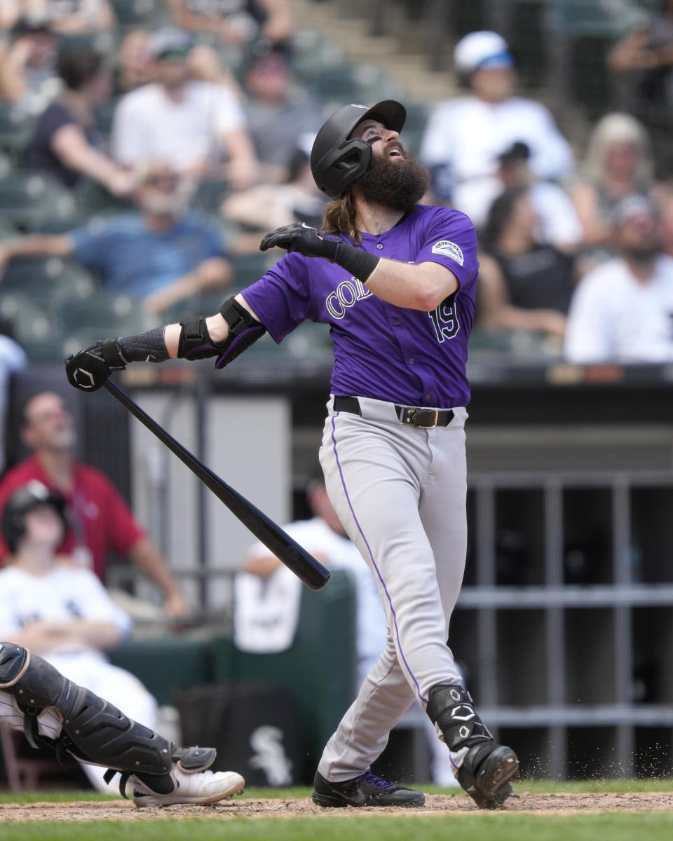 Colorado Rockies' Charlie Blackmon watches his popup during the eighth inning of a baseball game against the Chicago White Sox, Saturday, June 29, 2024, in Chicago. (AP Photo/Charles Rex Arbogast)